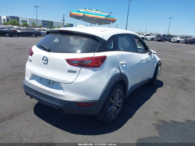 Mazda pe 2017 JM1DKDC72H0165927 Image 4
