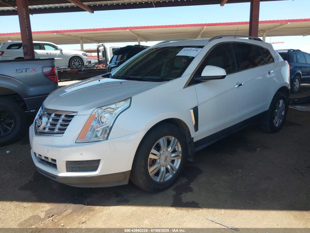 2014 CADILLAC SRX 3GYFNBE30ES615460 Photo 1