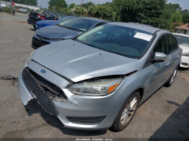 2015 FORD FOCUS 1FADP3F27FL376330 Photo 1