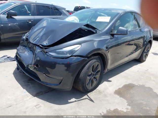 2024 TESLA MODEL Y 7SAYGDEE1RF988952 Photo 1