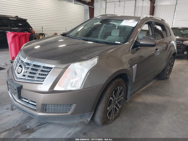 2014 CADILLAC SRX 3GYFNEE32ES562391 Photo 1