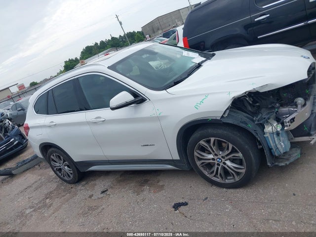 WBXHU7C34H5H38345 BMW X1