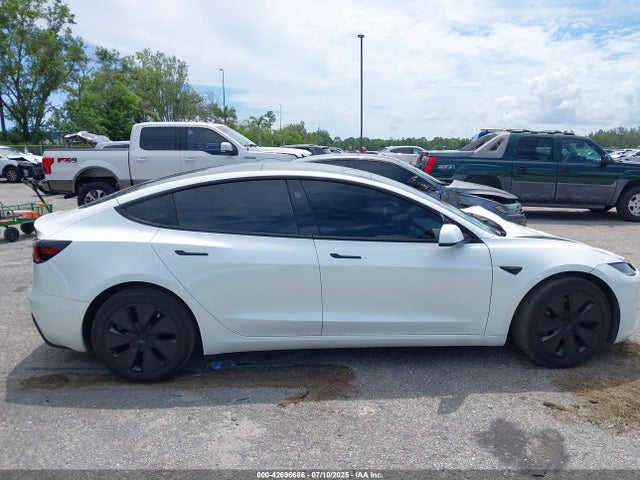 5YJ3E1EA9RF727223 Tesla 2024