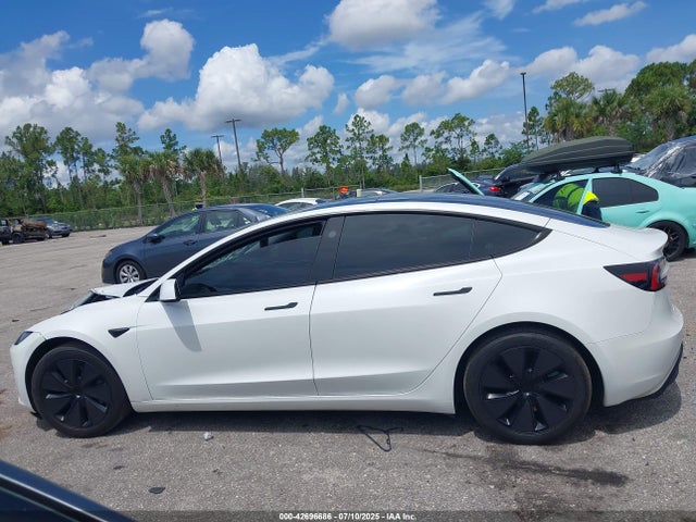 5YJ3E1EA9RF727223 Tesla 2024