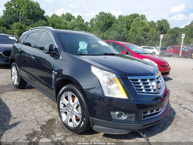 2014 CADILLAC SRX 3GYFNCE33ES543658 Photo 0