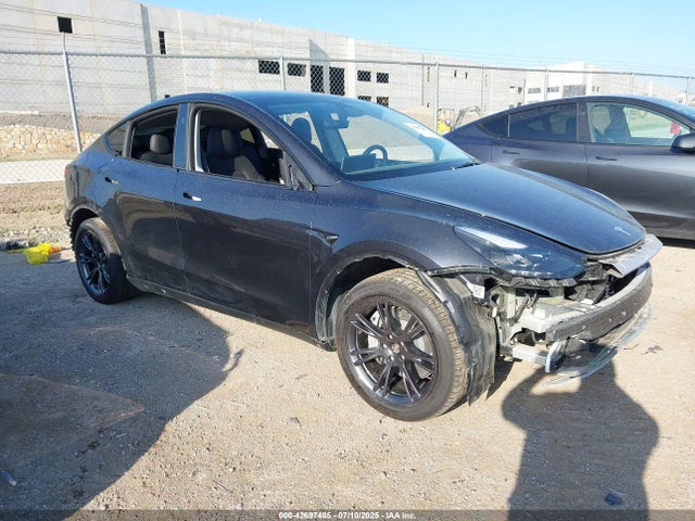 2024 TESLA MODEL Y 7SAYGDEE1RA323790 Photo 0