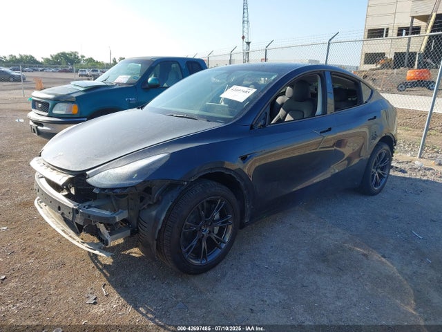 2024 TESLA MODEL Y 7SAYGDEE1RA323790 Photo 1
