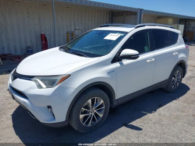 2018 TOYOTA RAV4 HYBRID JTMRJREV9JD170056 Photo 1
