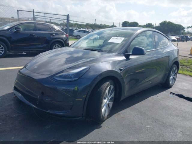 2024 TESLA MODEL Y 7SAYGDEE0RF007882 Photo 1
