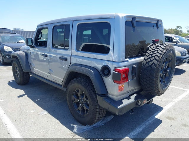 1C4HJXDG0MW697799 Jeep 2021