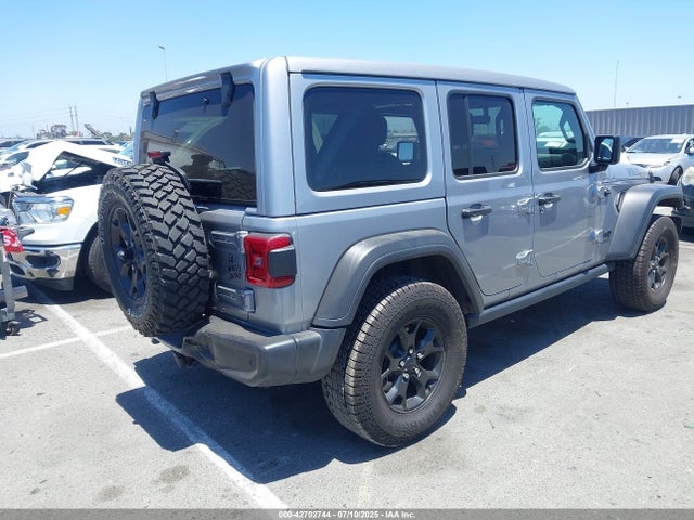 1C4HJXDG0MW697799 Jeep 2021