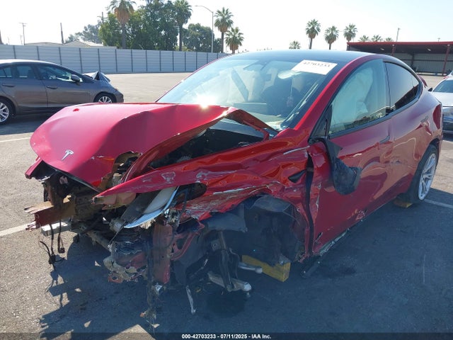 2021 TESLA MODEL Y 5YJYGDEEXMF213801 Photo 1