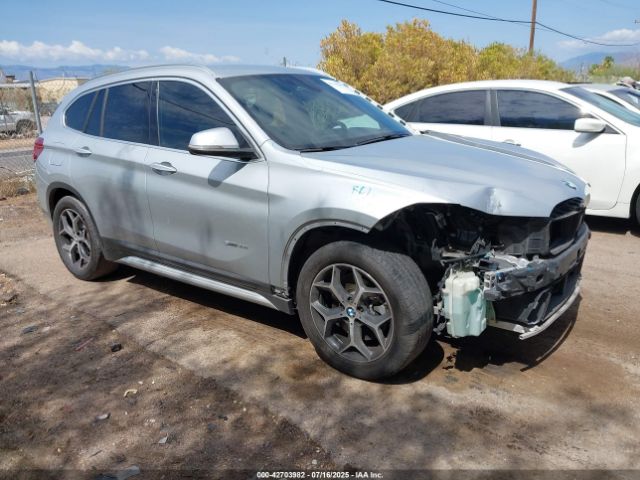 2017 BMW X1 WBXHU7C3XH5H33232