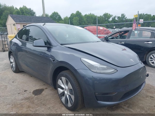 2023 TESLA MODEL Y 7SAYGDED5PF943050 Photo 0