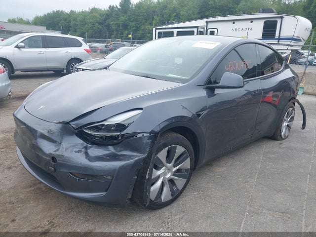 2023 TESLA MODEL Y 7SAYGDED5PF943050 Photo 1