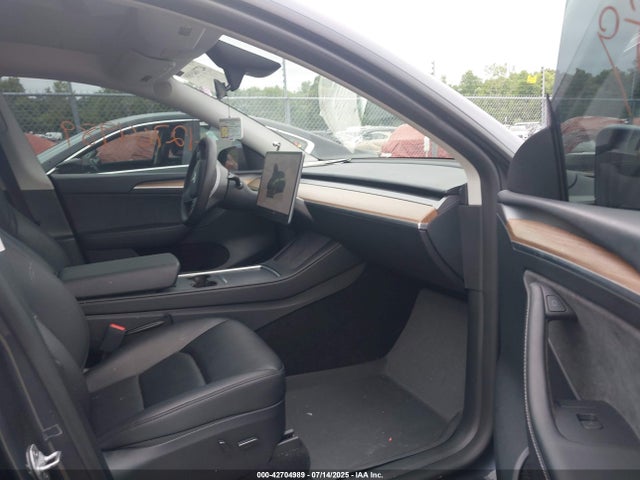 2023 TESLA MODEL Y 7SAYGDED5PF943050 Photo 4