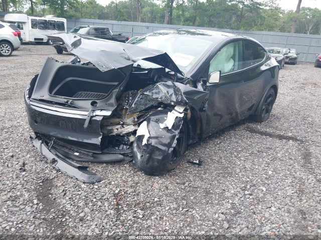 2026 TESLA MODEL Y 7SAYGDED1TF376975 Photo 1