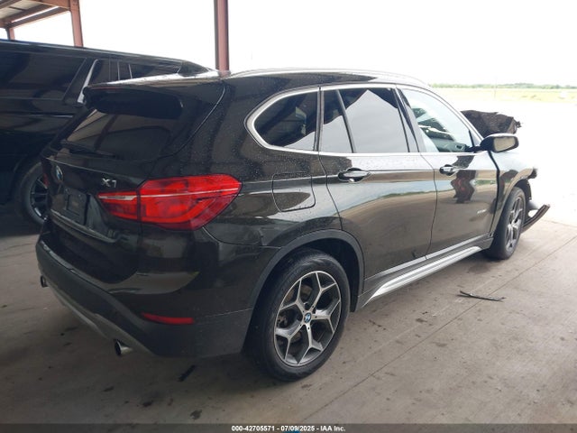 WBXHT3C30GP884771 BMW X1