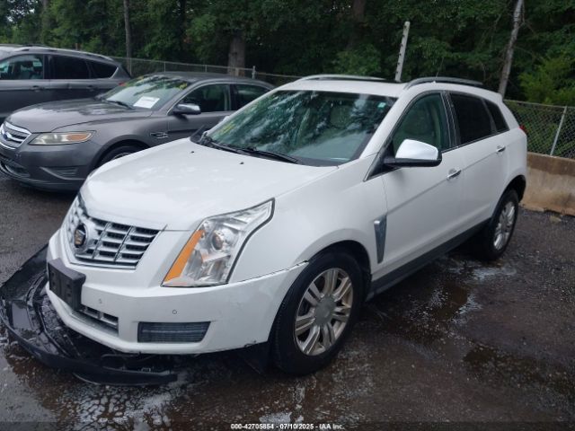 2014 CADILLAC SRX 3GYFNEE39ES675495 Photo 1