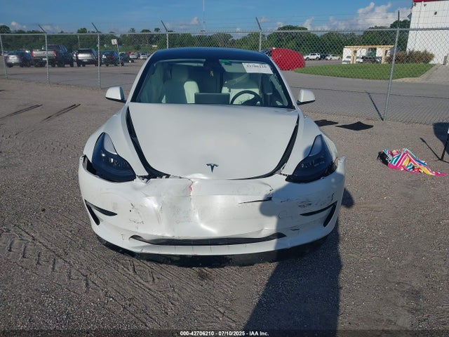5YJ3E1EB4MF055329 Tesla 2021
