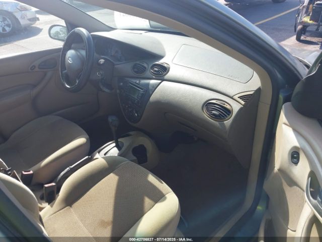 2003 FORD FOCUS 1FAFP34P13W304346 Photo 4