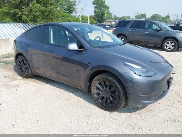 2023 TESLA MODEL Y 7SAYGDEE5PF895915 Photo 0