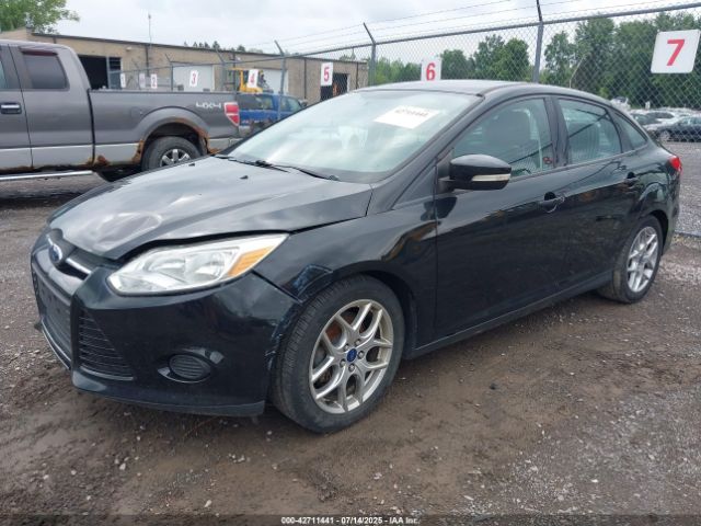 2015 FORD FOCUS 1FADP3F26FL274551 Photo 1