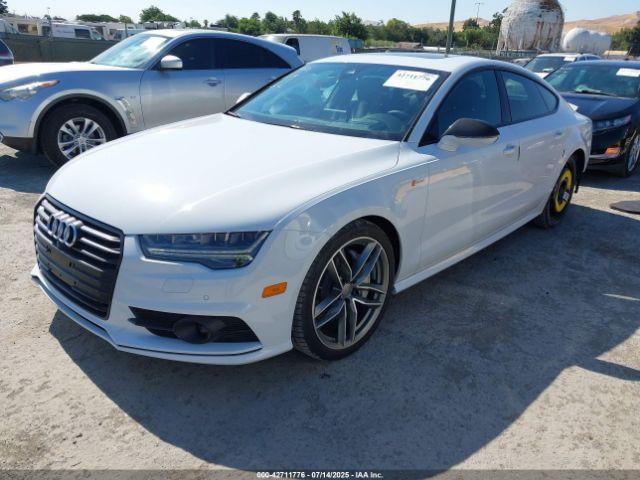 2016 AUDI A7 WAU2GAFC9GN062082 Photo 1