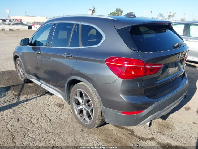 2016 BMW X1 WBXHT3C30G5E55323 Photo 2