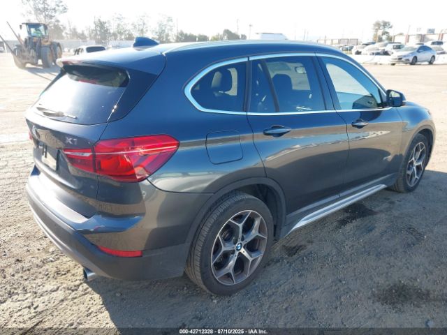 2016 BMW X1 WBXHT3C30G5E55323 Photo 3
