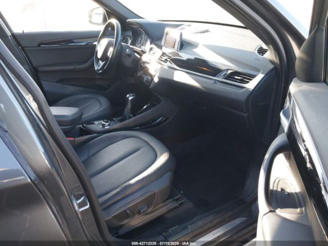 2016 BMW X1 WBXHT3C30G5E55323 Photo 4