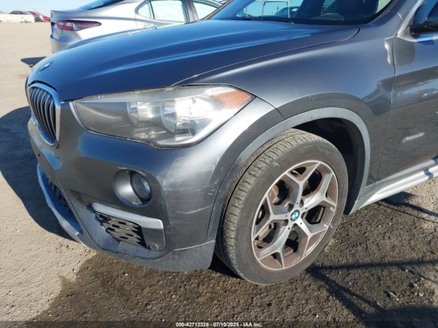 2016 BMW X1 WBXHT3C30G5E55323 Photo 5