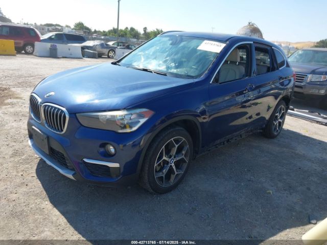 2018 BMW X1 WBXHT3C33J5L28506 Photo 1