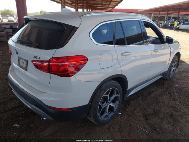 WBXHT3C37J5K30644 BMW X1