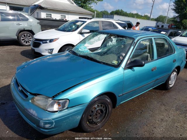 1999 TOYOTA COROLLA 2T1BR12E6XC134802 Photo 1