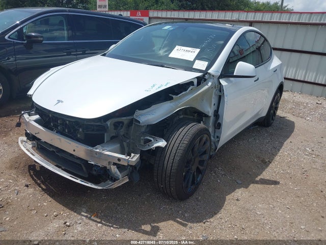 2023 TESLA MODEL Y 7SAYGDEE8PA044303 Photo 1