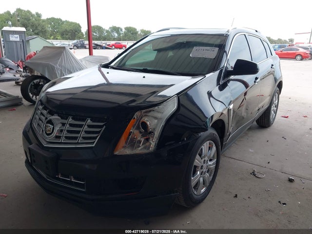 2014 CADILLAC SRX 3GYFNEE38ES682566 Photo 1