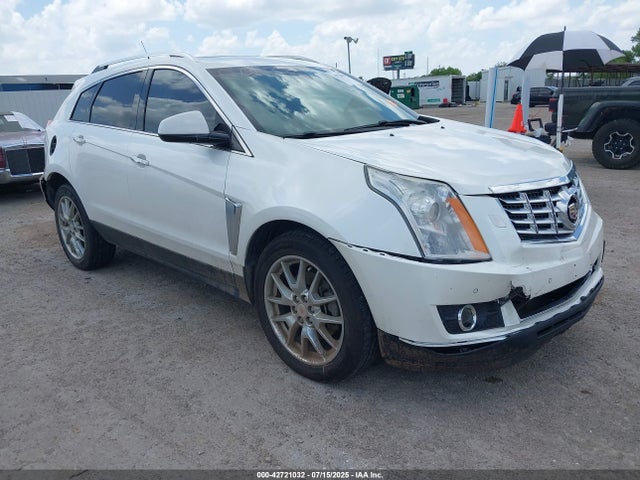 2014 CADILLAC SRX 3GYFNCE32ES658896 Photo 0