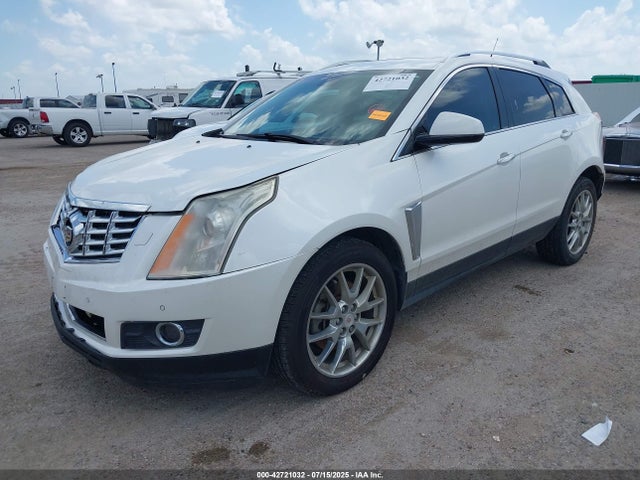 2014 CADILLAC SRX 3GYFNCE32ES658896 Photo 1