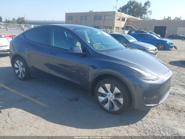 2023 TESLA MODEL Y 7SAYGDED4PF966724 Photo 0