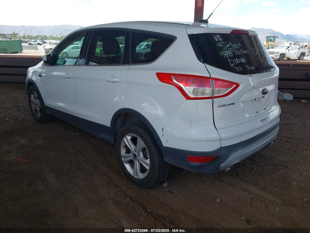 1FMCU9GX9EUD38081 Ford 2014