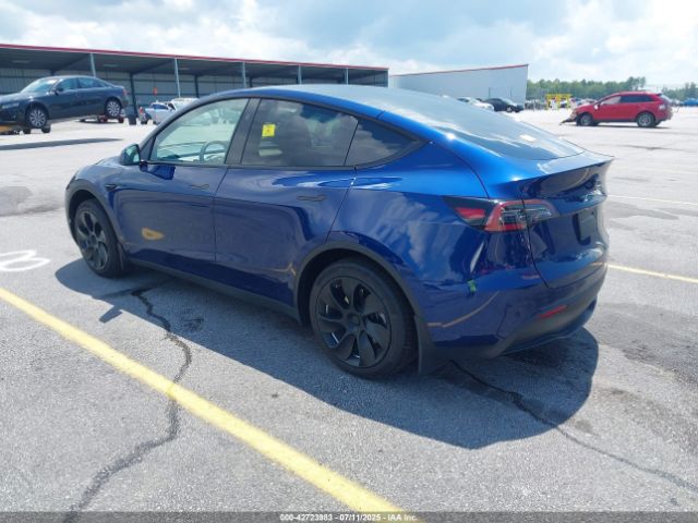 2024 TESLA MODEL Y 7SAYGDED5RF015208 Photo 2