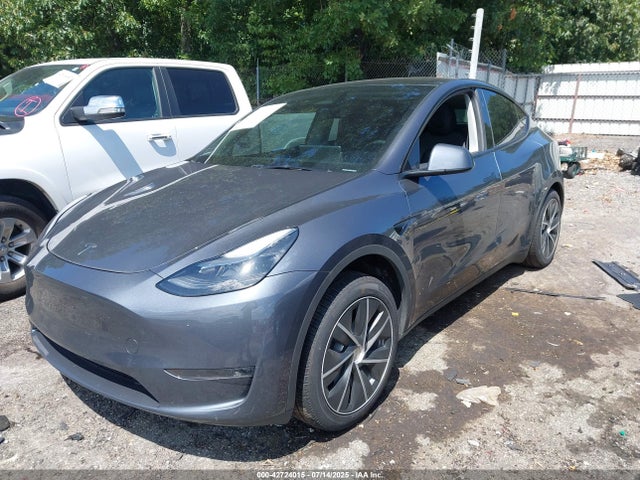 2023 TESLA MODEL Y 7SAYGDEE2PA201632 Photo 1