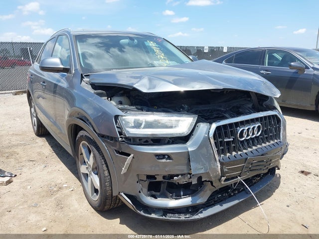 2015 AUDI Q3 WA1GFCFS9FR011343 Photo 0
