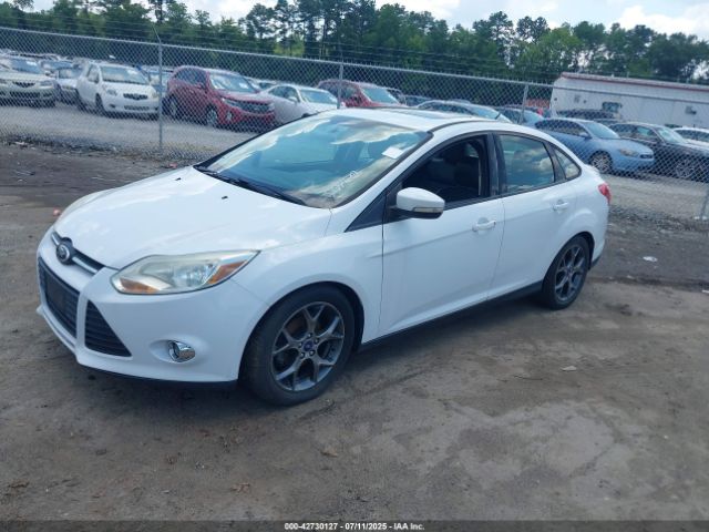 2014 FORD FOCUS 1FADP3F27EL251021 Photo 1