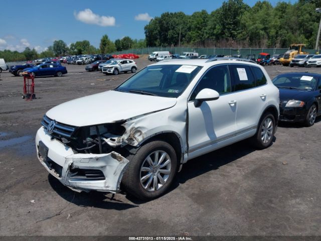 2012 VOLKSWAGEN TOUAREG WVGEF9BP9CD008352 Photo 1