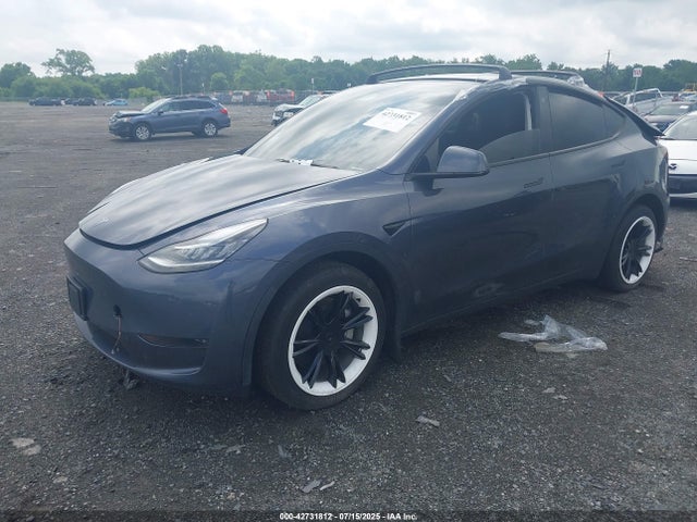 2023 TESLA MODEL Y 7SAYGDEE6PA120620 Photo 1