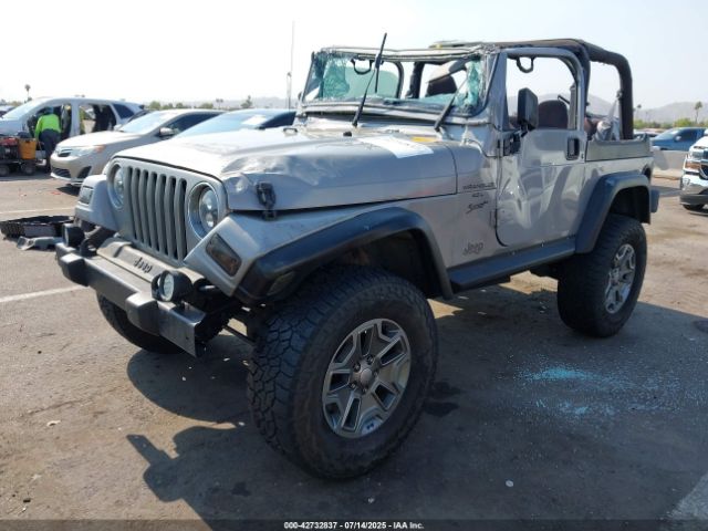 2000 JEEP WRANGLER 1J4FA49S3YP734387 Photo 1