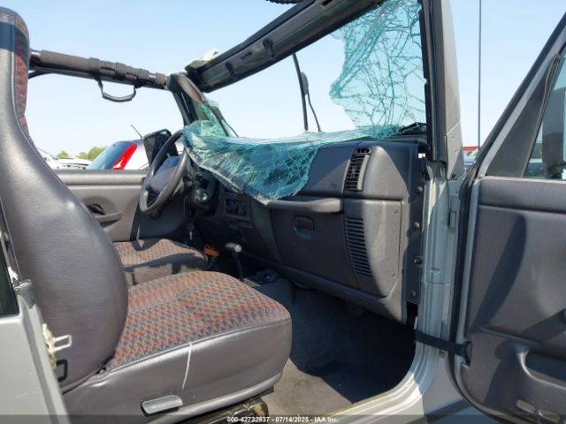 2000 JEEP WRANGLER 1J4FA49S3YP734387 Photo 4