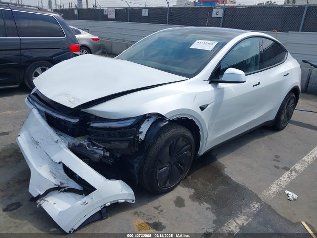 2026 TESLA MODEL Y 7SAYGDED8TF383969 Photo 1